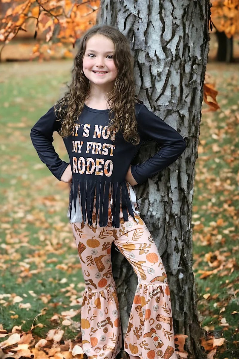 “It’s Not My First Rodeo” Fall Fringe Top with Multi-printed Bottoms