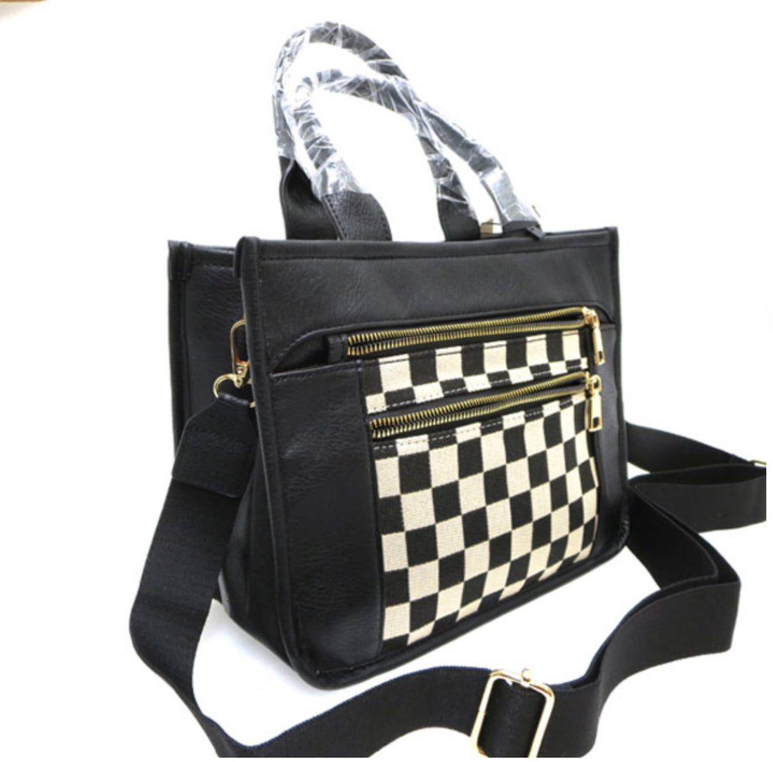 Black Faux Leather Handbag Featuring A Checkered Front Pocket