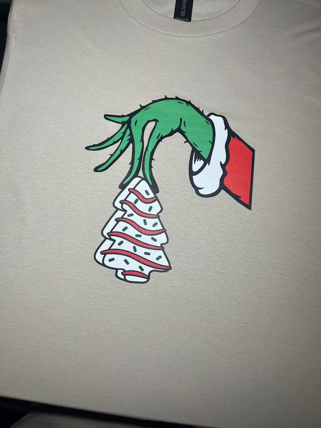 Grinch Stealing Christmas Tree Cake Graphic Tee