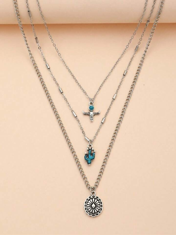 Layered Silver Chain Necklace with Small Pendants