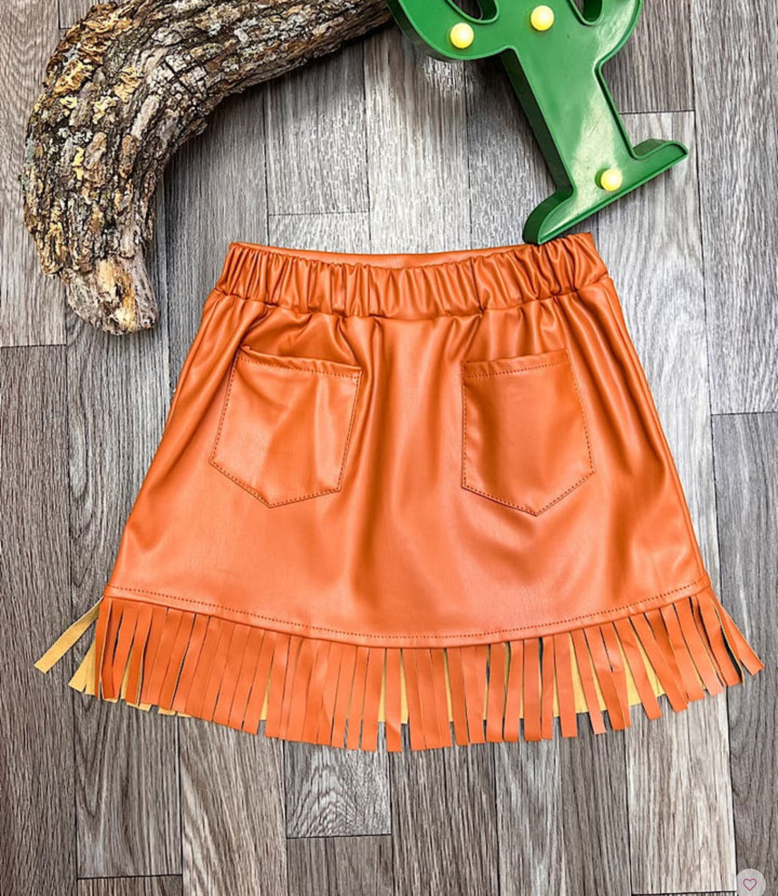 FAUX LEATHER FRINGE HEM SKIRT