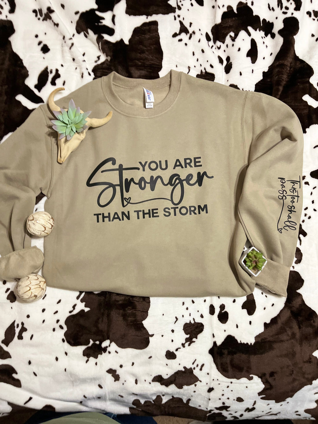 You Are Stronger Than The Storm Graphic Sweatshirt