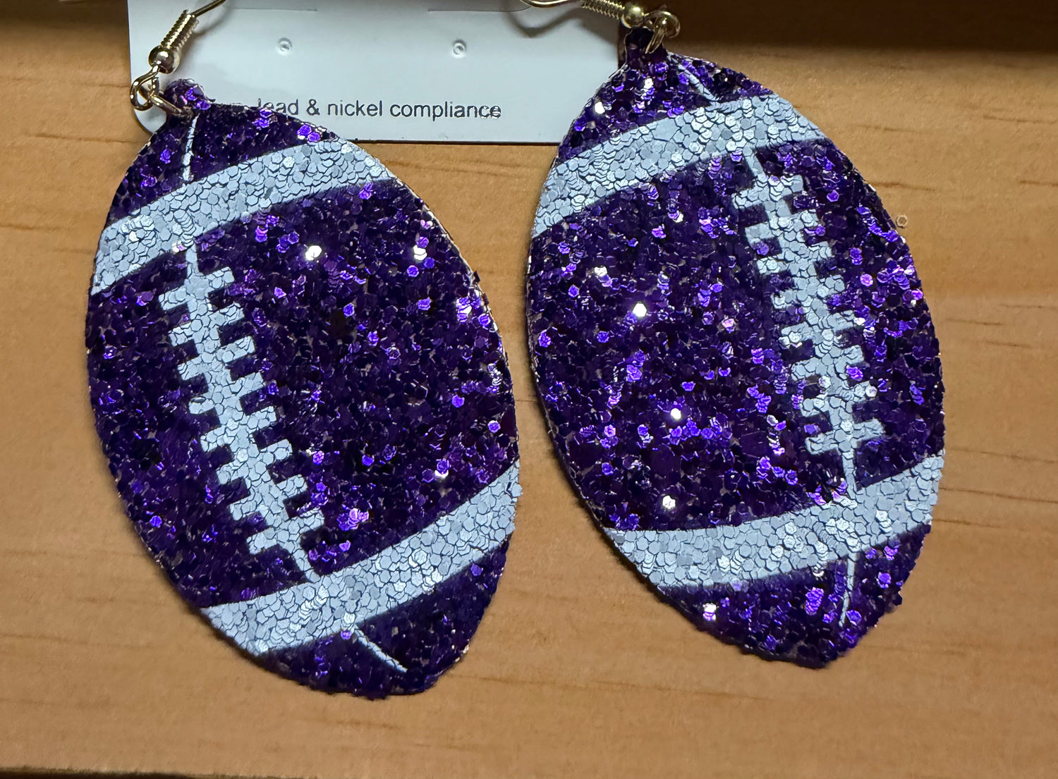 Purple Sparkle Football Dangle Earrings