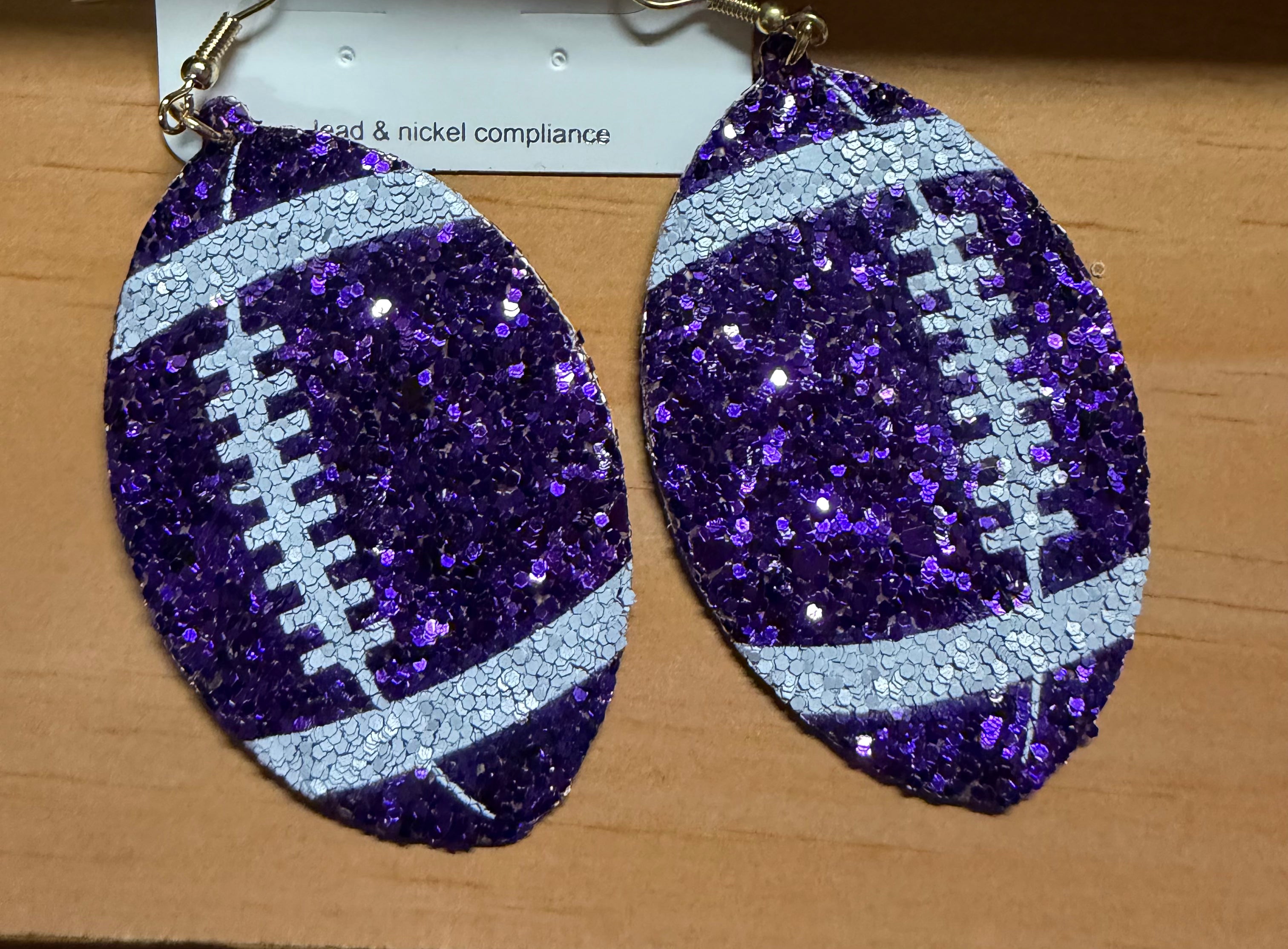 Purple Sparkle Football Dangle Earrings