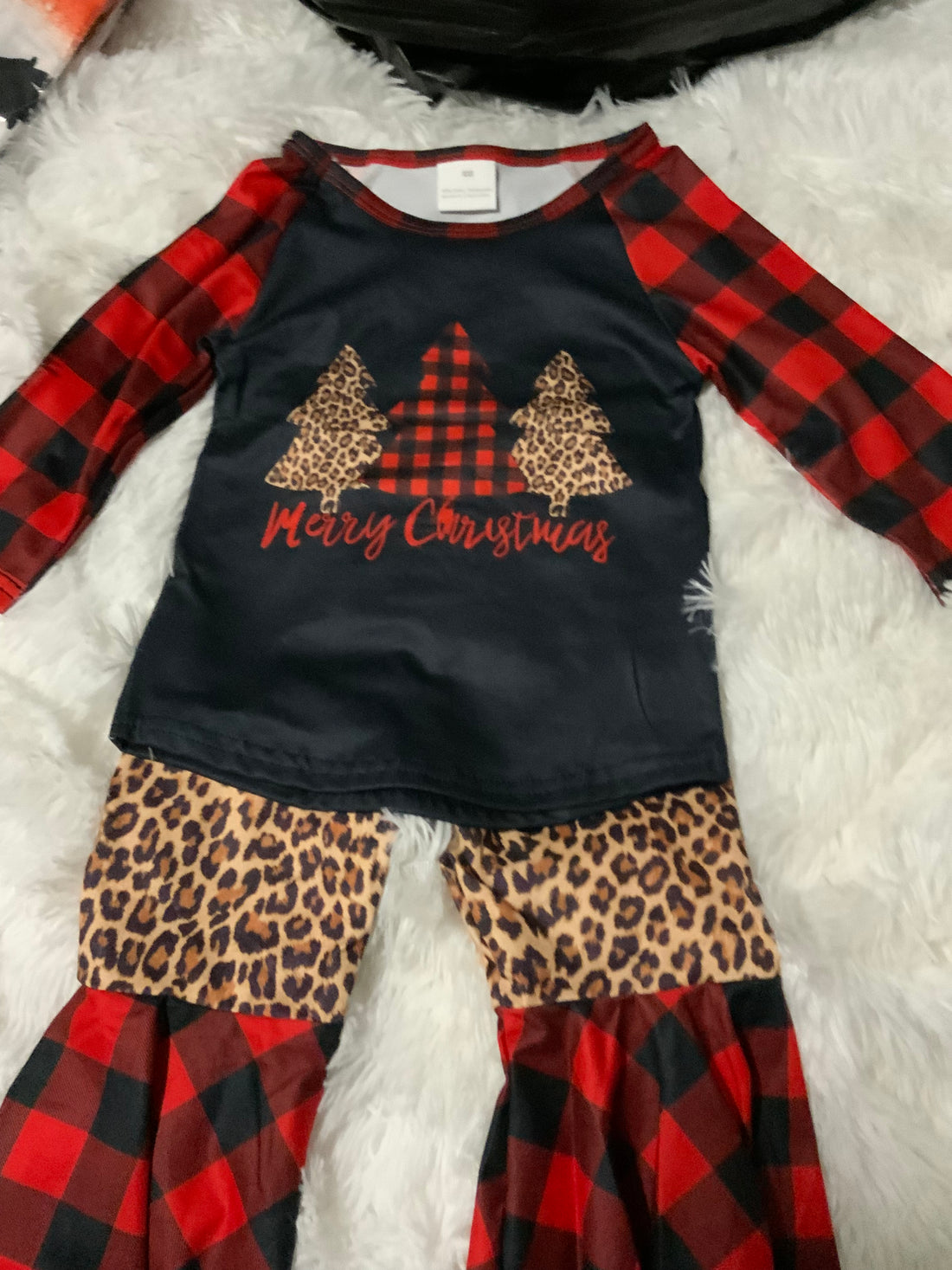 Merry Christmas Long Sleeve Black Graphic Top with Cheetah and Plaid and Bell-bottoms.